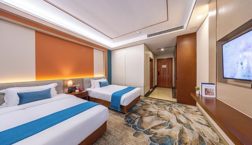 Habitación básica con 2 camas individuales