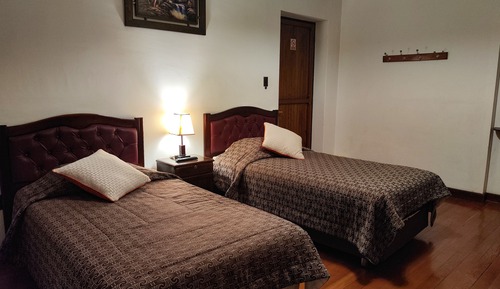 Habitación triple Deluxe, patio, vistas al jardín