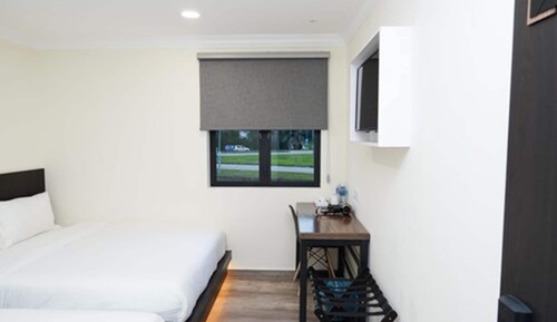 Habitación triple ejecutiva