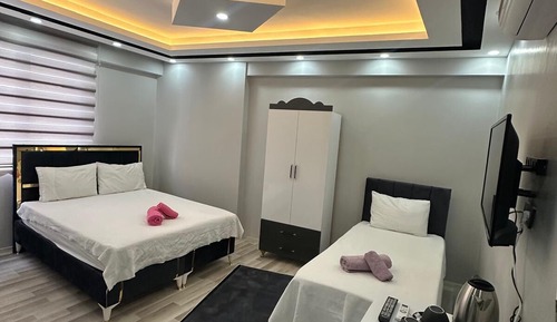 Habitación triple, vistas a la ciudad