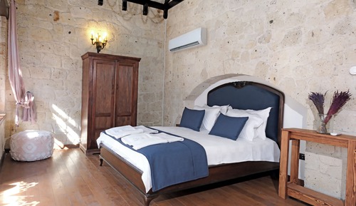 Habitación triple Deluxe, varias camas