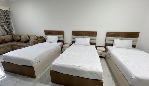 Habitación triple, vistas al mar