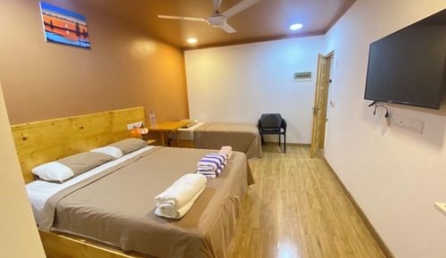 Habitación triple Deluxe