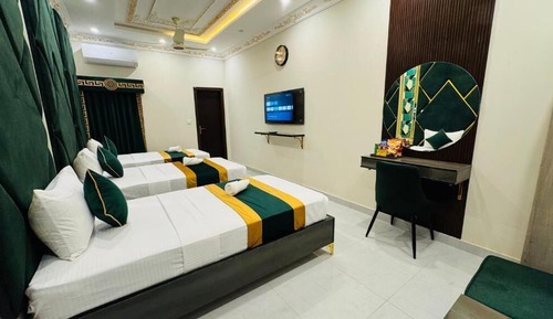 Habitación triple Deluxe, vistas a la ciudad