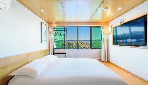 Habitación individual Confort, vistas parciales al mar