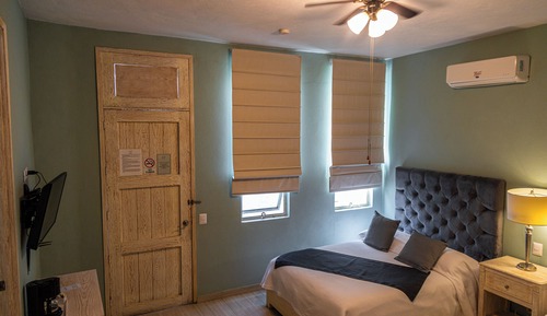 Habitación Deluxe, varias camas, Aire acondicionado