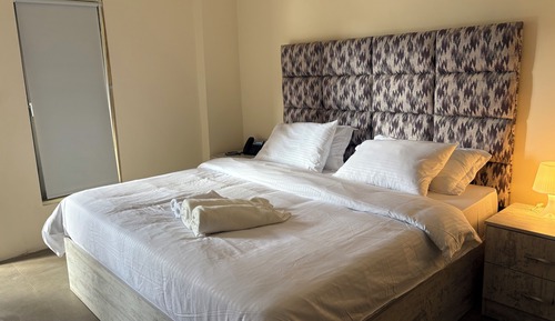 Habitación triple, vistas al jardín