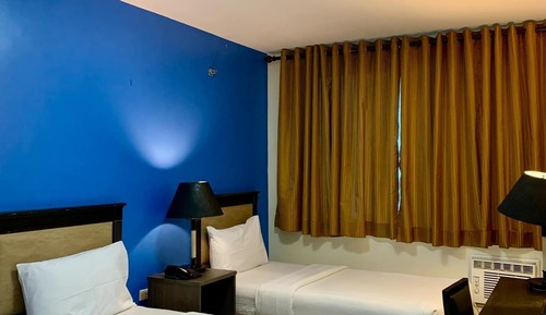 Habitación estándar con 1 cama doble o 2 individuales