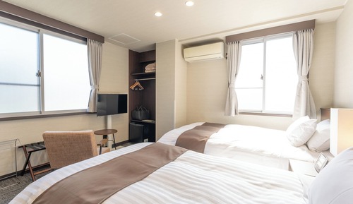 Habitación con 2 camas individuales, no fumadores, baño privado (Single + Extra Bed)