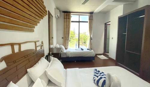 Habitación triple Deluxe