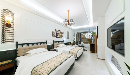 Habitación exclusiva con 2 camas individuales, varias camas, vistas a la ciudad