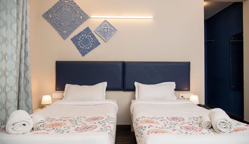 Habitación Premier con 1 cama doble o 2 individuales, balcón