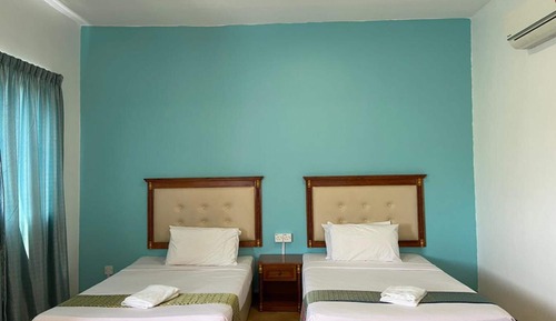 Habitación Elite con 2 camas individuales