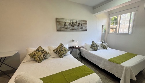 Habitación cuádruple exclusiva, balcón, vistas al patio