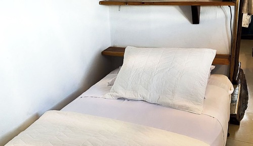 Habitación triple, vistas al mar