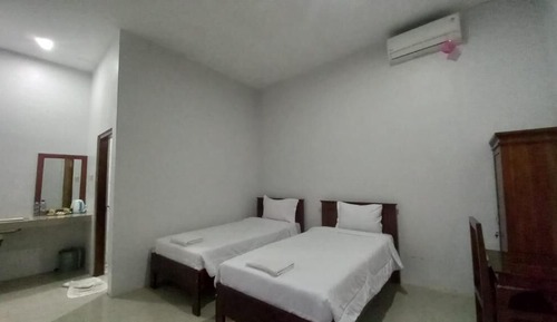 Habitación Deluxe con 2 camas individuales, balcón, vistas al jardín