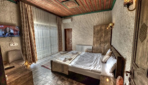 Habitación triple familiar, vistas al jardín