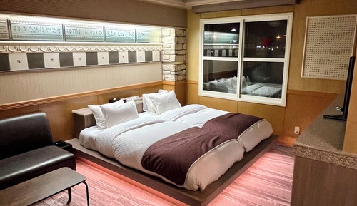 Habitación superior con 2 camas individuales, vistas a la ciudad