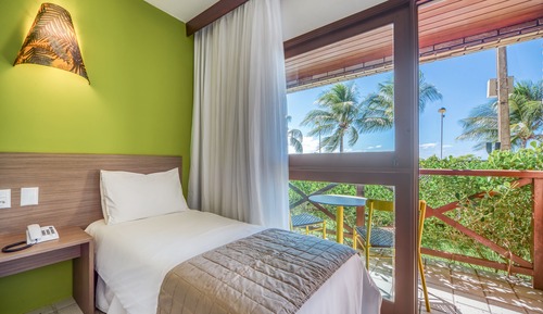 Habitación triple, vistas al mar