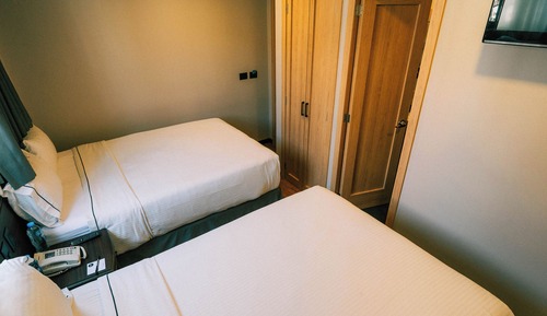 Habitación cuádruple Deluxe, 2 camas dobles, vistas a la ciudad