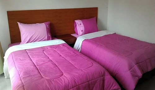 Habitación con 2 camas individuales