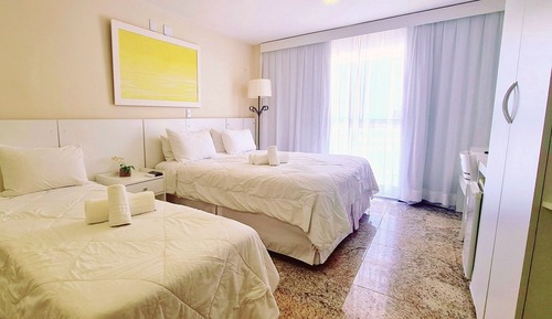 Habitación estándar, varias camas, balcón, vistas parciales al mar