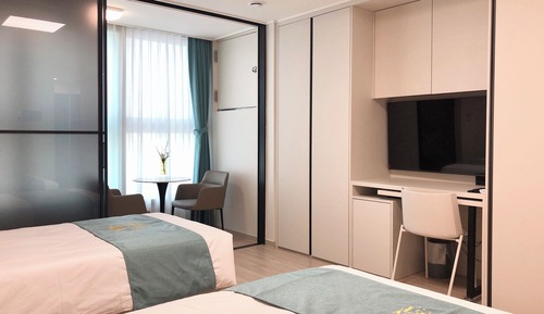 Habitación familiar con 2 camas individuales