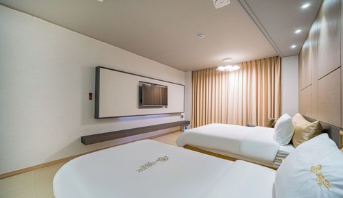 Habitación familiar con 2 camas individuales