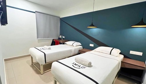 Habitación con 2 camas individuales