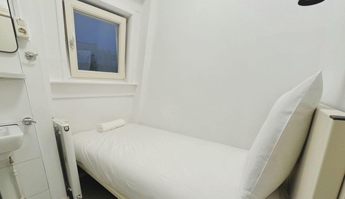 Habitación individual económica, baño compartido