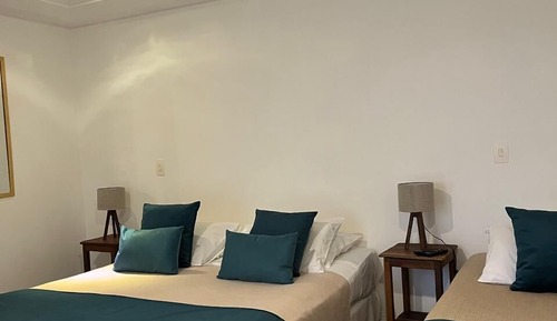 Habitación triple, vistas al mar