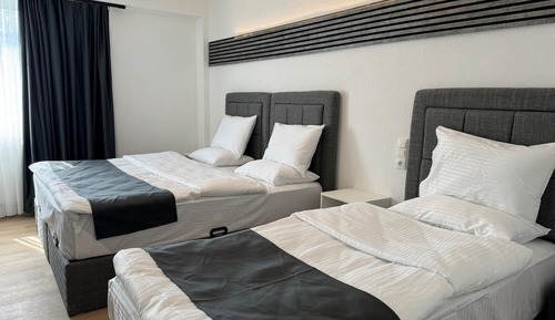 Habitación familiar con 2 camas individuales