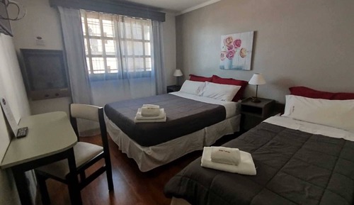 Habitación triple Premium, varias camas
