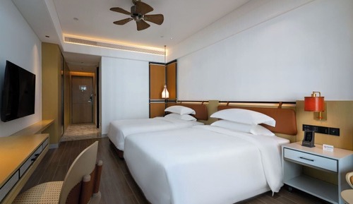 Habitación superior con 2 camas individuales, vistas a la ciudad