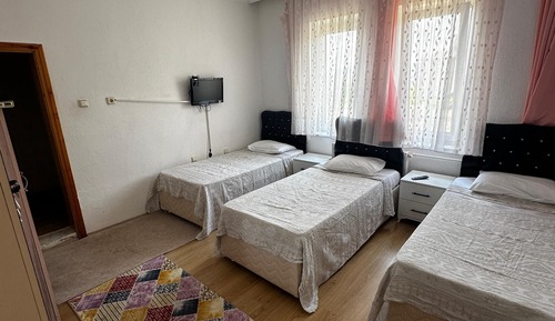 Habitación triple, vistas a la colina
