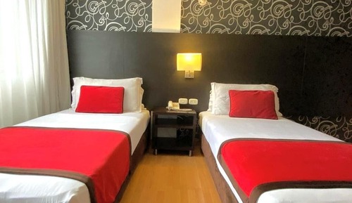 Habitación junior con 1 cama doble o 2 individuales