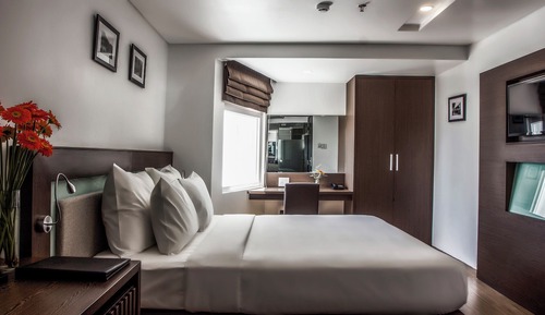 Habitación ejecutiva con 1 cama doble o 2 individuales, vistas a la ciudad