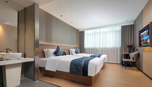 Habitación estándar con 2 camas individuales, varias camas