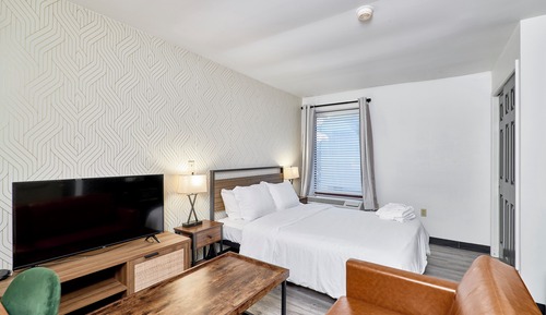 Habitación triple Deluxe, 1 cama de matrimonio con sofá cama, no fumadores, baño privado