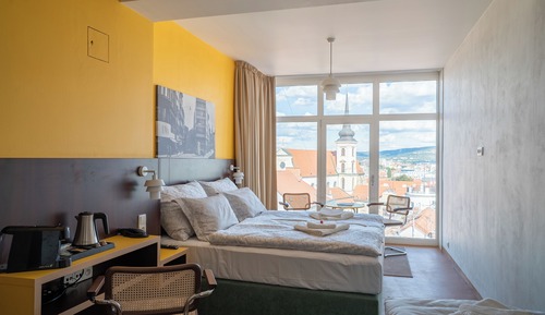 Habitación panorámica, varias camas, vistas a la ciudad, planta ejecutiva