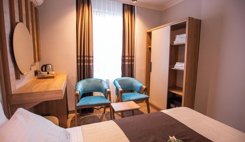 Habitación Premium con 1 cama doble o 2 individuales, vistas parciales al mar