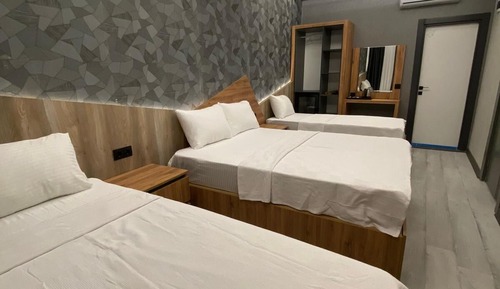 Habitación cuádruple estándar, varias camas