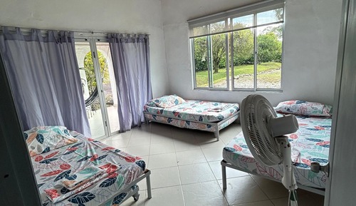 Habitación triple Confort, vistas al jardín