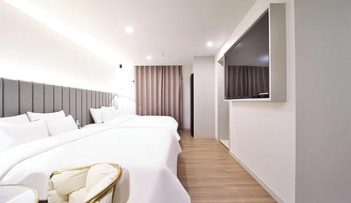 Habitación familiar con 2 camas individuales