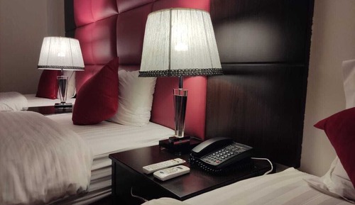 Habitación triple, vistas a la ciudad