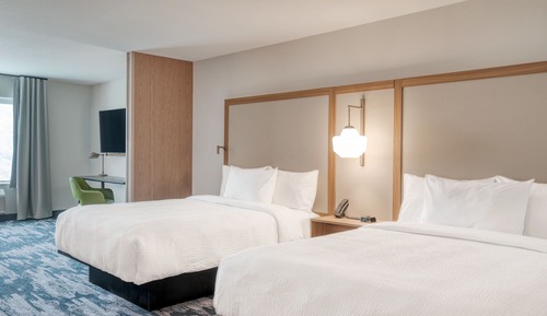 Habitación, varias camas