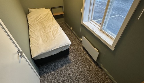 Habitación individual, baño compartido