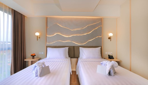 Habitación superior con 1 cama doble o 2 individuales, vistas a la ciudad