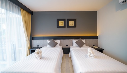 Habitación Deluxe con 2 camas individuales, vistas a la piscina