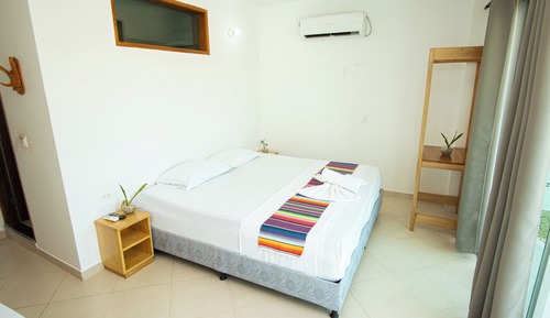 Habitación triple superior, varias camas